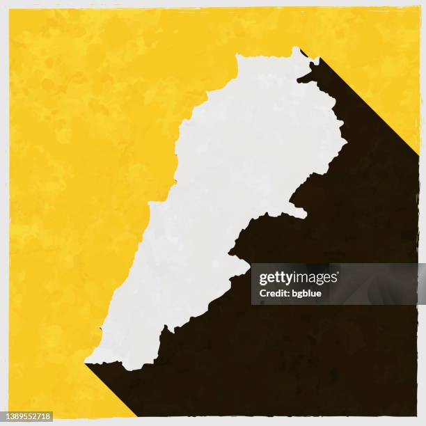 lebanon map with long shadow on textured yellow background - lebanon country stock illustrations