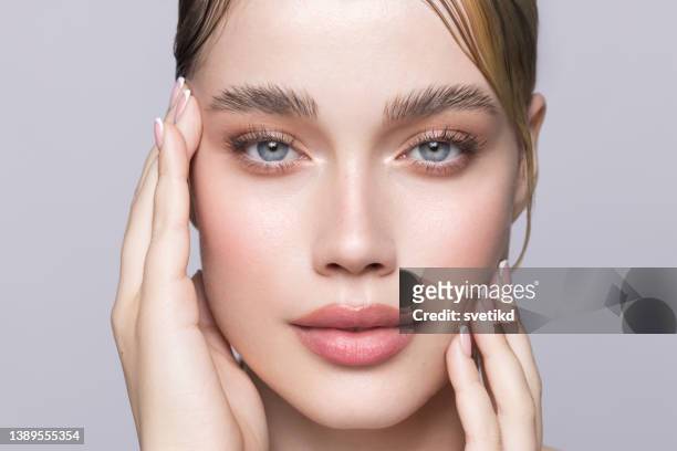 beauty portrait of young woman - eyebrow stock pictures, royalty-free photos & images