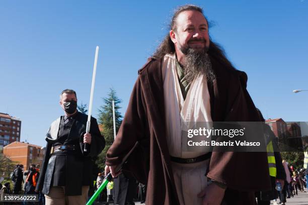 People dressed with Star Wars costumes take part in a parade during a charity event in favor of several associations in the area in Aluche, April 3...