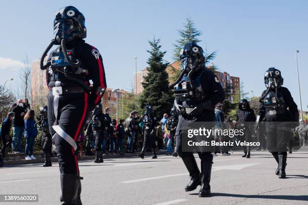 People dressed with Star Wars costumes take part in a parade during a charity event in favor of several associations in the area in Aluche, April 3...