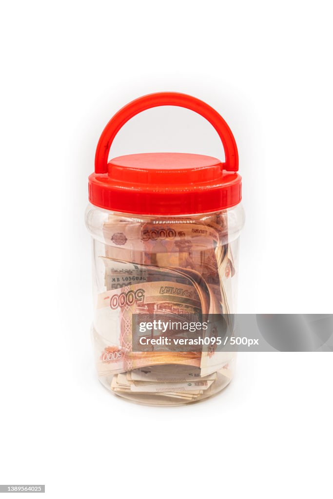 Glass jar with Russian money Save or hide money in the bank