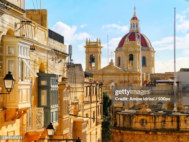 malta views,low angle view of buildings in city,malta - modern malta stock pictures, royalty-free photos & images