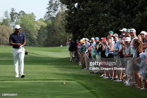 Tiger Woods of the United States walks to the ninth tee during a practice round prior to the Masters at Augusta National Golf Club on April 04, 2022...
