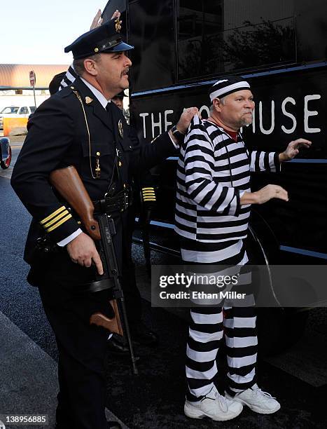 Members of the San Diego Police Historical Society and Museum perform for guests as they arrive at the grand opening of The Mob Museum February 14,...