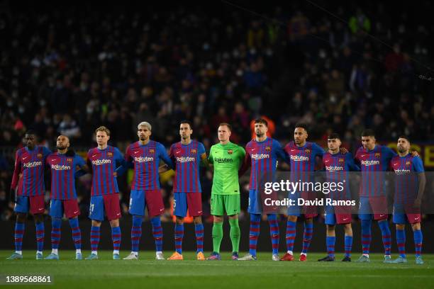 Barcelona players hold a minute of silence prior to the LaLiga Santander match between FC Barcelona and Sevilla FC at Camp Nou on April 03, 2022 in...