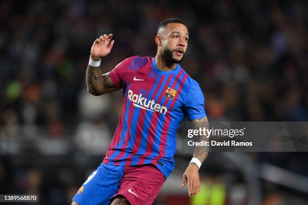 Memphis Depay of FC Barcelona looks on during the LaLiga Santander match between FC Barcelona and Sevilla FC at Camp Nou on April 03, 2022 in...