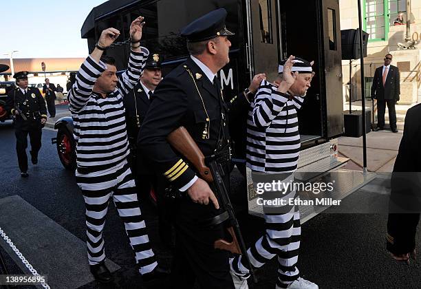 Members of the San Diego Police Historical Society and Museum perform for guests as they arrive at the grand opening of The Mob Museum February 14,...