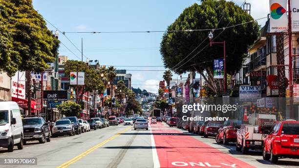 san francisco - mission district traffic - san fransisco stock pictures, royalty-free photos & images