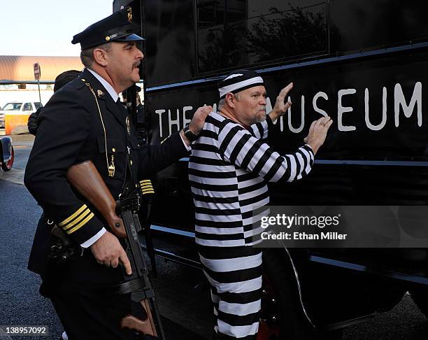 Members of the San Diego Police Historical Society and Museum perform for guests as they arrive at the grand opening of The Mob Museum February 14,...