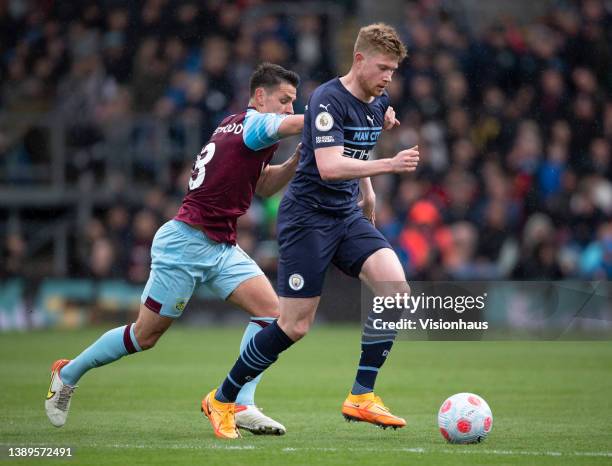 Kevin De Bruyne of Manchester City and Ashley Westwood of Burnley in action during the Premier League match between Burnley and Manchester City at...