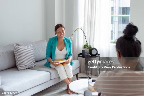 female psychologist consulting patient - truth stock pictures, royalty-free photos & images