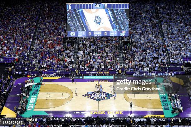 The opening tipoff is seen from above in the game between the Kansas Jayhawks and the North Carolina Tar Heels during the 2022 NCAA Men's Basketball...