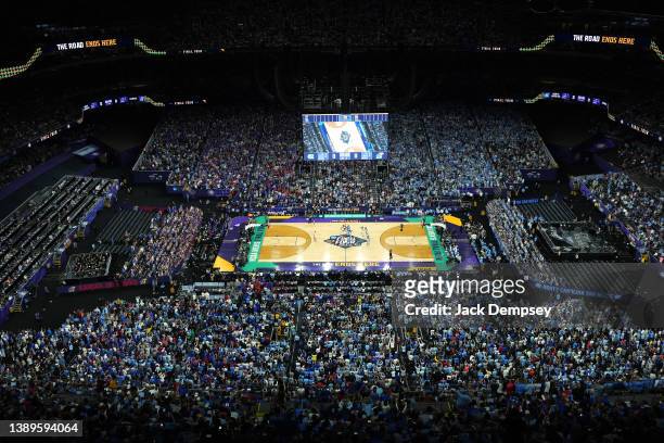 The opening tipoff between the Kansas Jayhawks and the North Carolina Tar Heels in the 2022 NCAA Men's Basketball Tournament National Championship...
