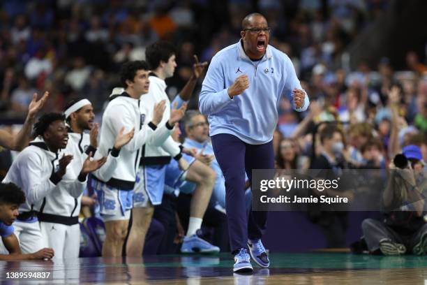 Head coach Hubert Davis of the North Carolina Tar Heels reacts on the sidelines in the first half of the game against the Kansas Jayhawks during the...