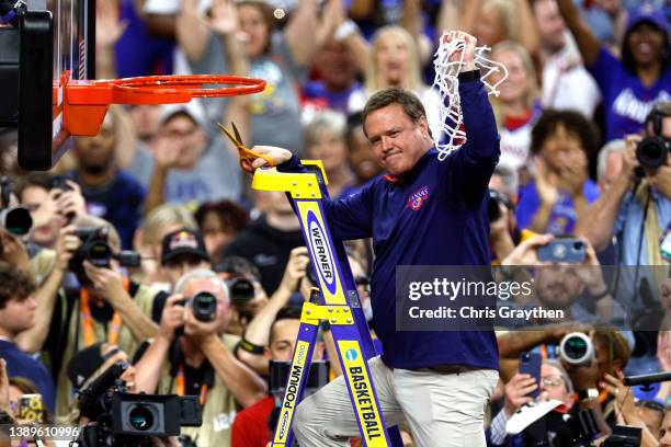 Head coach Bill Self of the Kansas Jayhawks cuts the net after defeating the North Carolina Tar Heels 72-69 during the 2022 NCAA Men's Basketball...