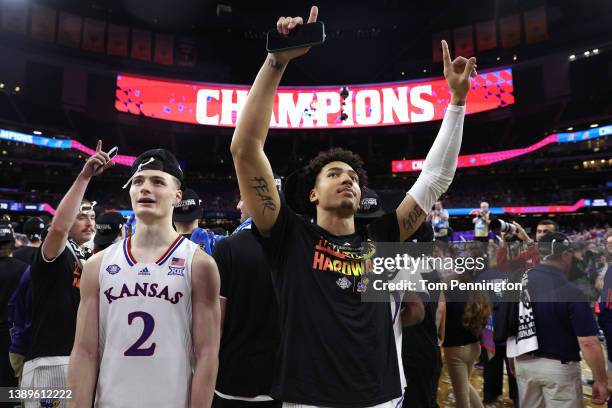 Christian Braun and Jalen Wilson of the Kansas Jayhawks celebrate after defeating the North Carolina Tar Heels 72-69 during the 2022 NCAA Men's...