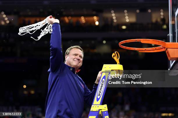 Head coach Bill Self of the Kansas Jayhawks cuts down the net after defeating the North Carolina Tar Heels 72-69 during the 2022 NCAA Men's...
