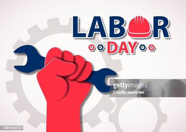 labor day hand holding wrench - labor day stock illustrations