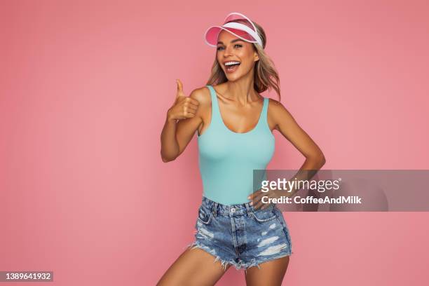 beautiful summer girl - pink shorts stock pictures, royalty-free photos & images