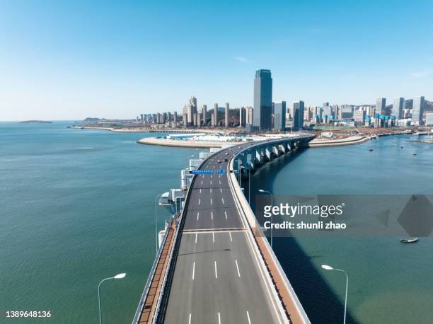 aerial view of cross-sea bridge - 長 ストックフォトと画像