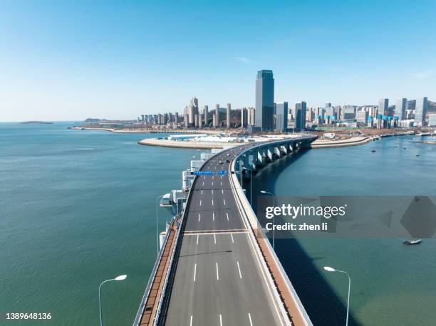 aerial view of cross-sea bridge - beach bird's eye perspective stock pictures, royalty-free photos & images