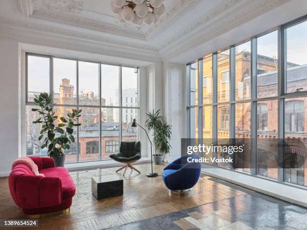 loft studio in a classic style - loft apartment windows stock pictures, royalty-free photos & images