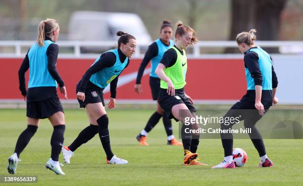 Lucy Bronze, Keira Walsh and Ellen White of England battle for the ball during a training session ahead of their Women's World Cup qualifier match...