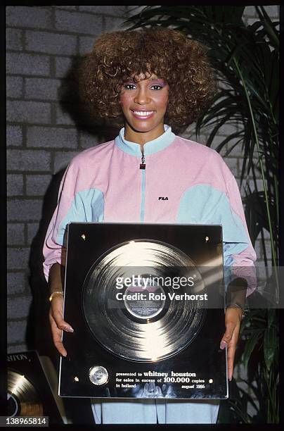 Whitney Houston, with Dutch Award for her debut album, Ahoy, Rotterdam, 21st October 1986.