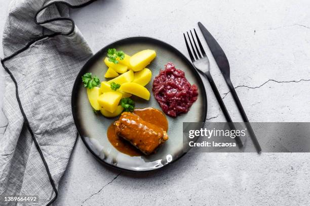 beef roulade with potato and red cabbage on plate - german food stock pictures, royalty-free photos & images