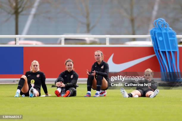 Alessia Russo, Lotte Wubben-Moy, Katie Zelem and Ella Toone of England look on during a training session ahead of their Women's World Cup qualifier...