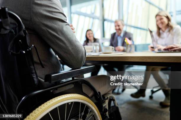 disabled businessman on a job interview in the office. - disability rights stock pictures, royalty-free photos & images