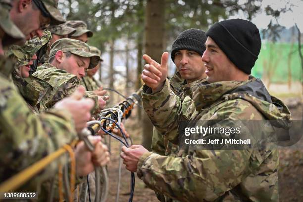 Soldiers from the 82nd Airborne take part in an exercise outside the operating base at the Arlamow Airport on April 05, 2022 in Wola Korzeniecka,...