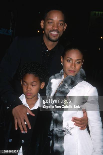 Married American actors Will Smith and Jada Pinkett Smith, with their son, Trey Smith, attend the world premiere of 'Ali' at Grauman Chinese Theater,...