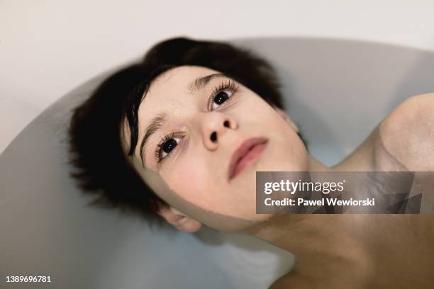 boy taking bath - underwater room stock pictures, royalty-free photos & images