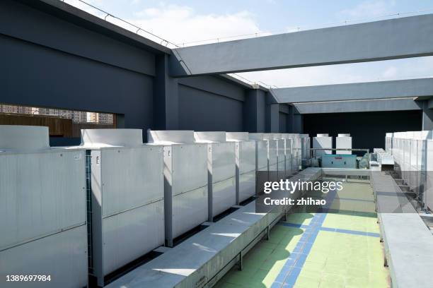 air conditioner equipment on the roof - chillar stock pictures, royalty-free photos & images