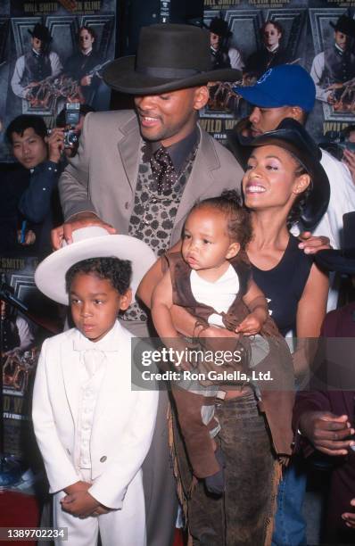 Married American actors Will Smith and Jada Pinkett Smith, with their sons, Trey Smith & Jaden Smith, attend the premiere of 'Wild Wild West' at Mann...