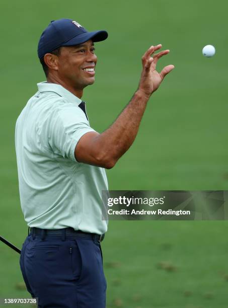 Tiger Woods of the United States warms up on the range during a practice round prior to the Masters at Augusta National Golf Club on April 05, 2022...