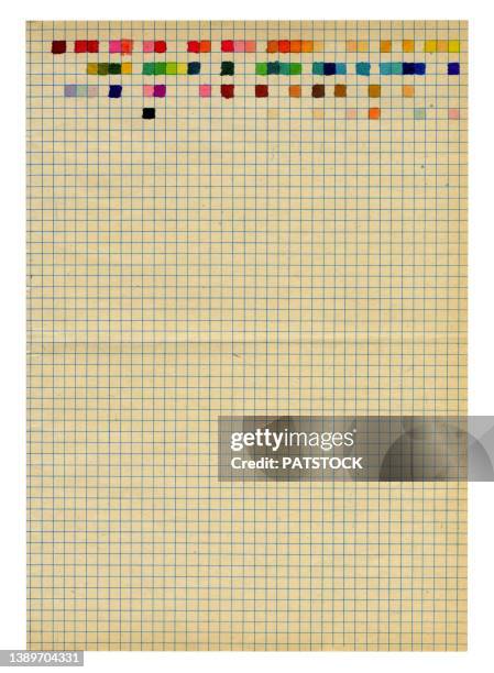 old yellowed graph checked sheet of paper with some grids colored with felt-tip pen. - 線入り用紙 ストックフォトと画像