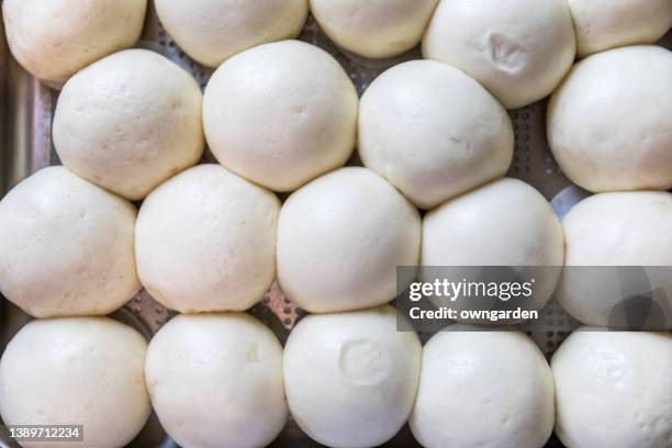 chinese steamed white buns - bao bun stock pictures, royalty-free photos & images