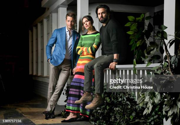 Actors Justin Hartley, Mandy Moore and Milo Ventimiglia are photographed for Los Angeles on February 22, 2022 on the Paramount Lot in Los Angeles,...