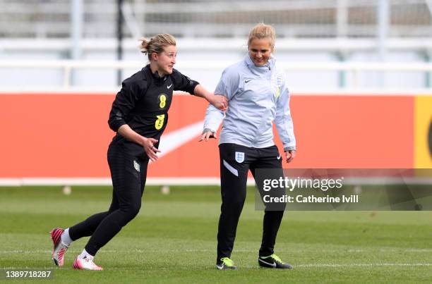 Sarina Wiegman, Manager of England and Ellen White of England interact during during a training session ahead of their Women's World Cup qualifier...