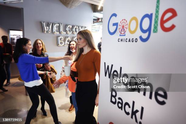 Employees are welcomed back to work with breakfast in the cafeteria at the Chicago Google offices on April 05, 2022 in Chicago, Illinois. Google...