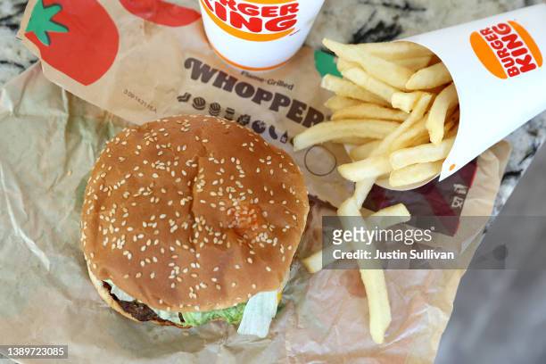In this photo illustration, a Burger King Whopper hamburger is displayed on April 05, 2022 in San Anselmo, California. A federal lawsuit has been...