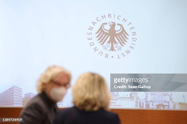 The logo of Germany's foreign intelligence service, the BND , is seen on a video monitor prior to a possible presentation at a meeting of the federal...