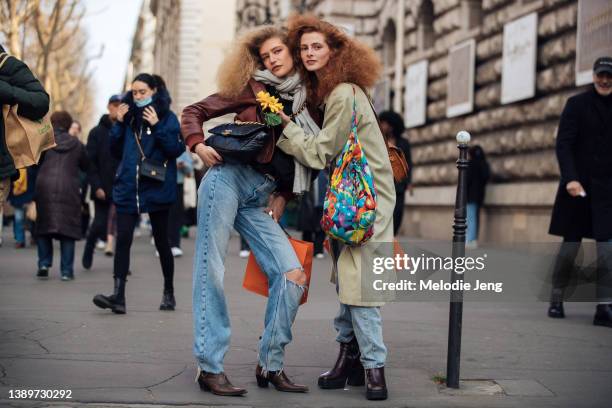 French models Mariam de Vinzelle and Clementine Balcaen pose with big hair by Gary Gill after the Hermes show at Caserne Gendarmerie Nationale-Garde...