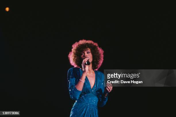 American singer Whitney Houston in concert, circa 1986.