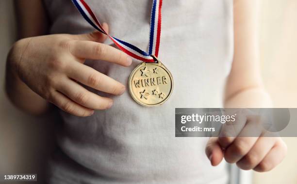 the winner - winning trophy hands stock pictures, royalty-free photos & images