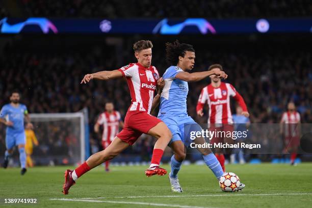 Nathan Ake of Manchester City and Marcos Llorente of Atletico Madrid battle for possession during the UEFA Champions League Quarter Final Leg One...