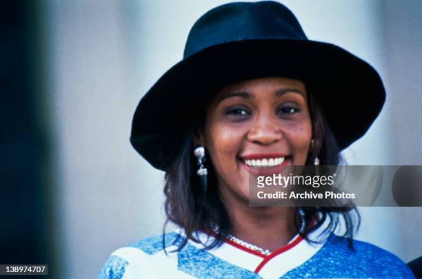 American singer Whitney Houston watches a World Cup soccer match, 1994.