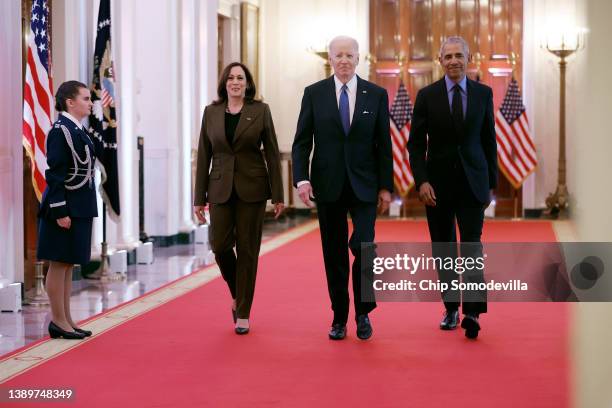 Vice President Kamala Harris, former President Barack Obama, and U.S. President Joe Biden arrive for an event to mark the 2010 passage of the...